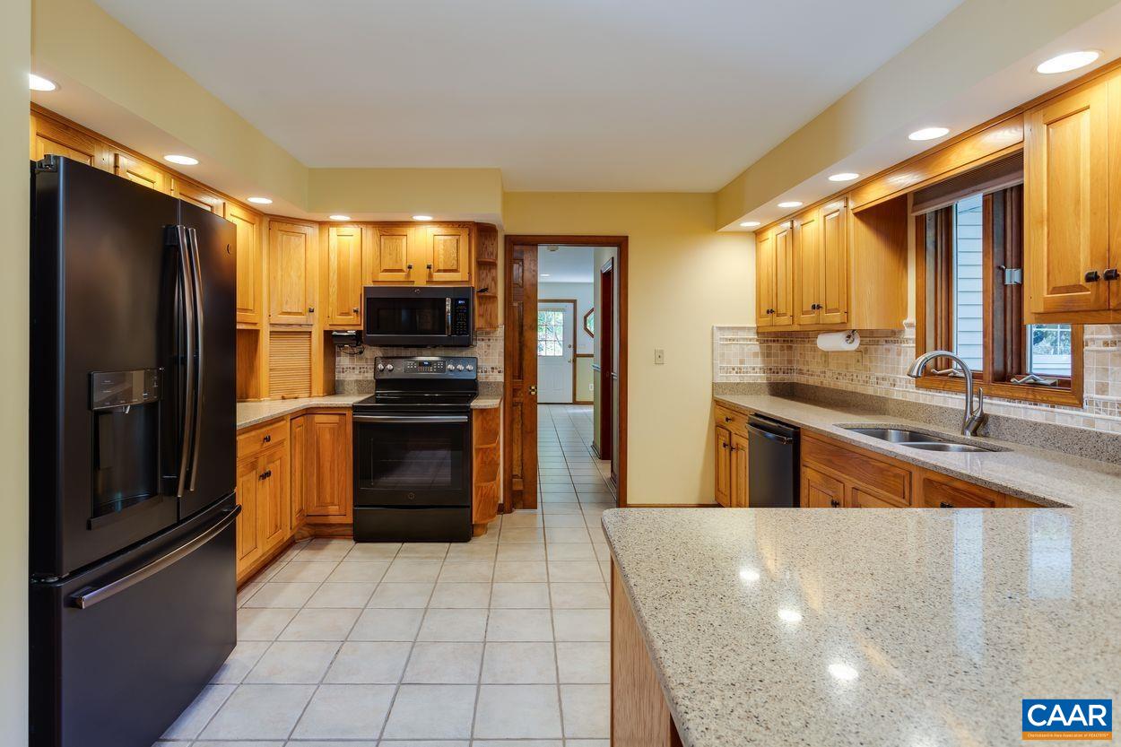 5904 Free Union Road Free Union, VA 22940 - Photo 15 of 75 a kitchen with stainless steel appliances a refrigerator a stove a sink and a oven