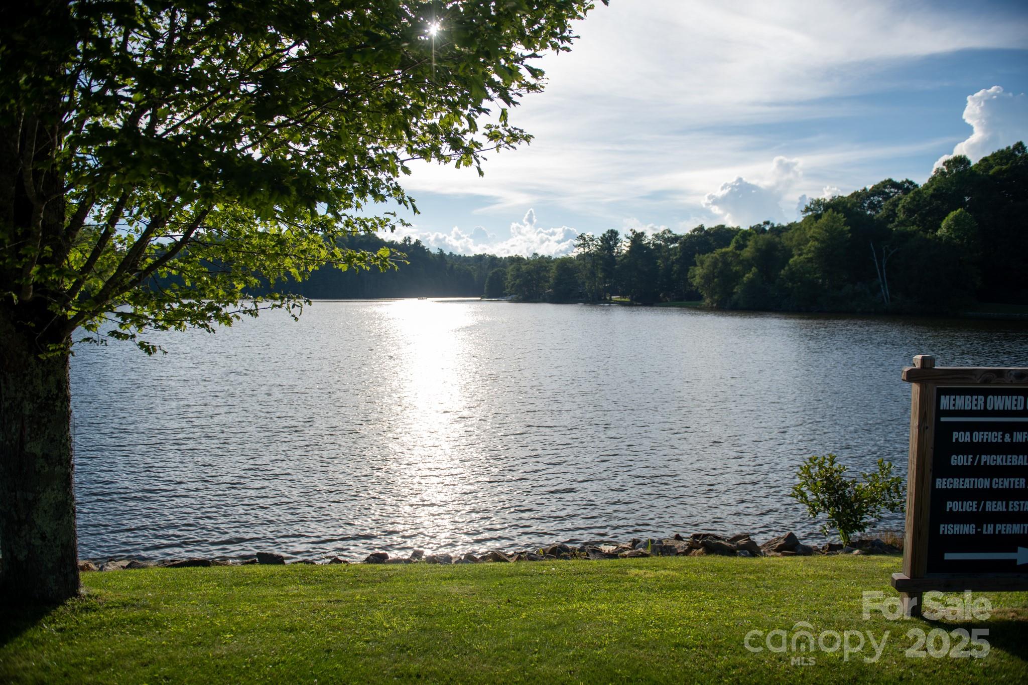 33 Summit Lane Newland, NC 28657 - Photo 13 of 48 a view of a lake from a yard