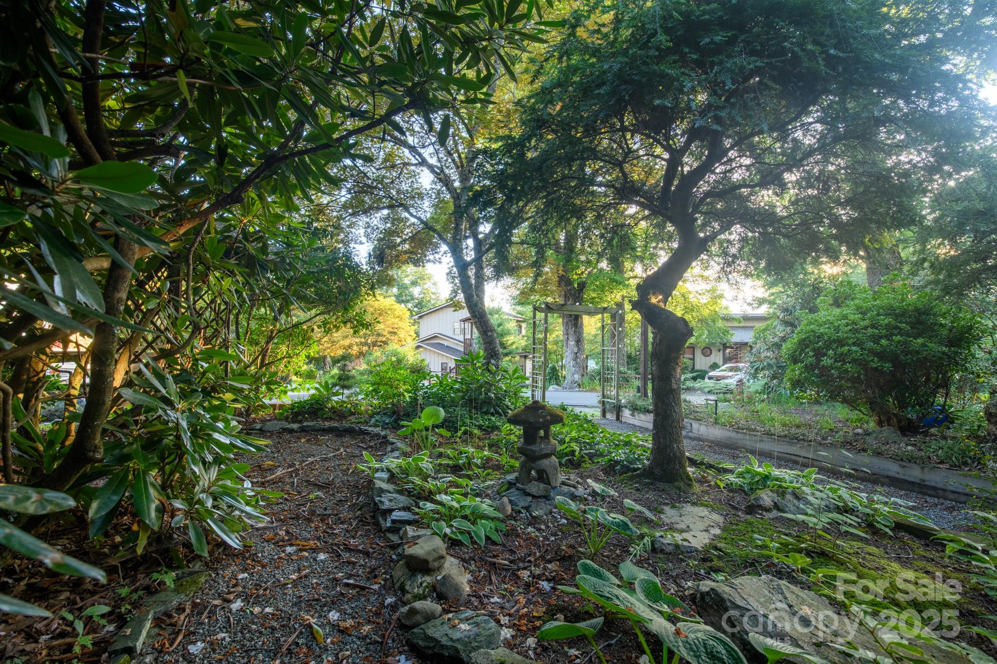 33 Summit Lane Newland, NC 28657 - Photo 16 of 48 a backyard of a house with lots of green space