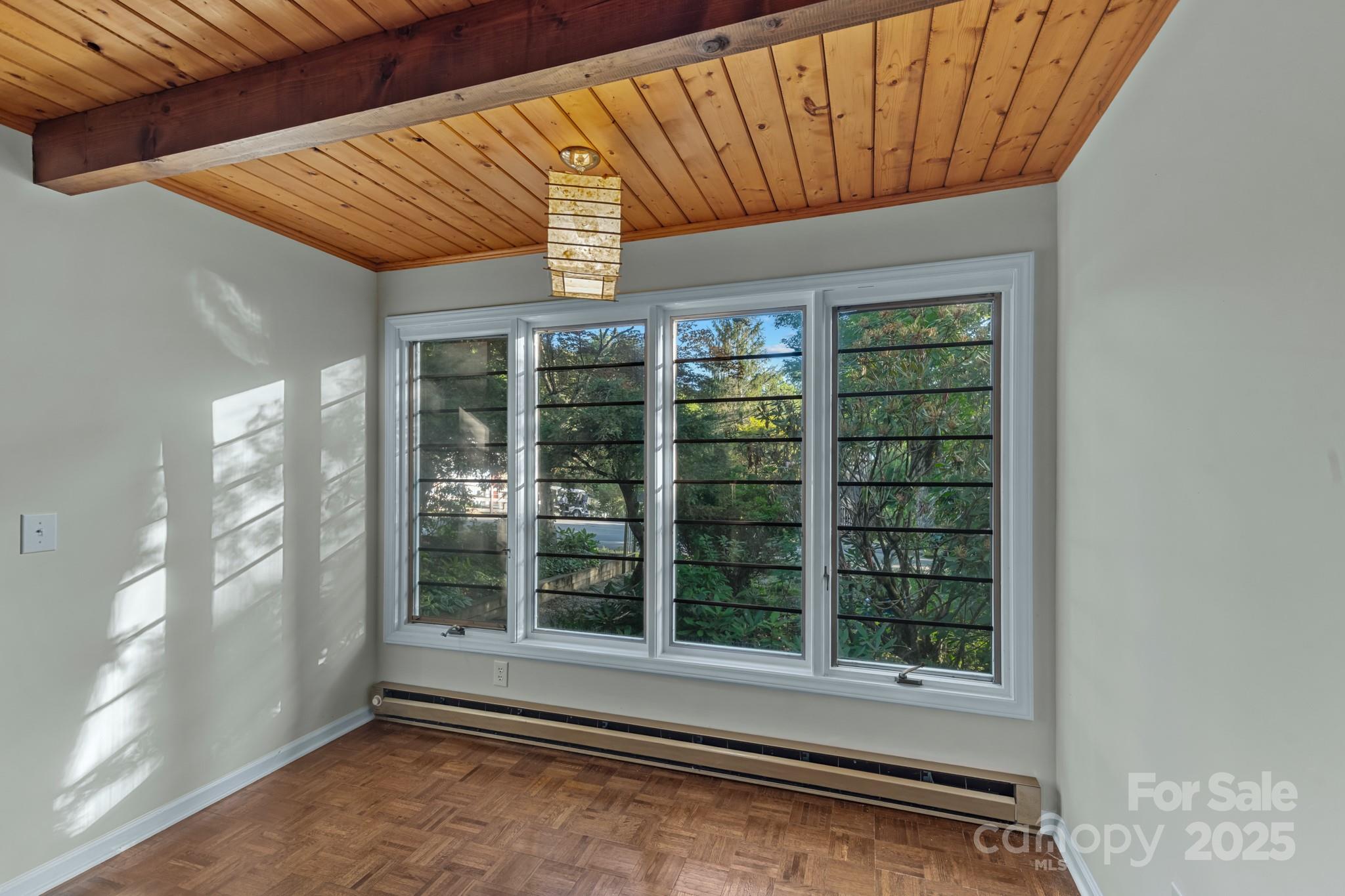 33 Summit Lane Newland, NC 28657 - Photo 34 of 48 a view of empty room with large windows
