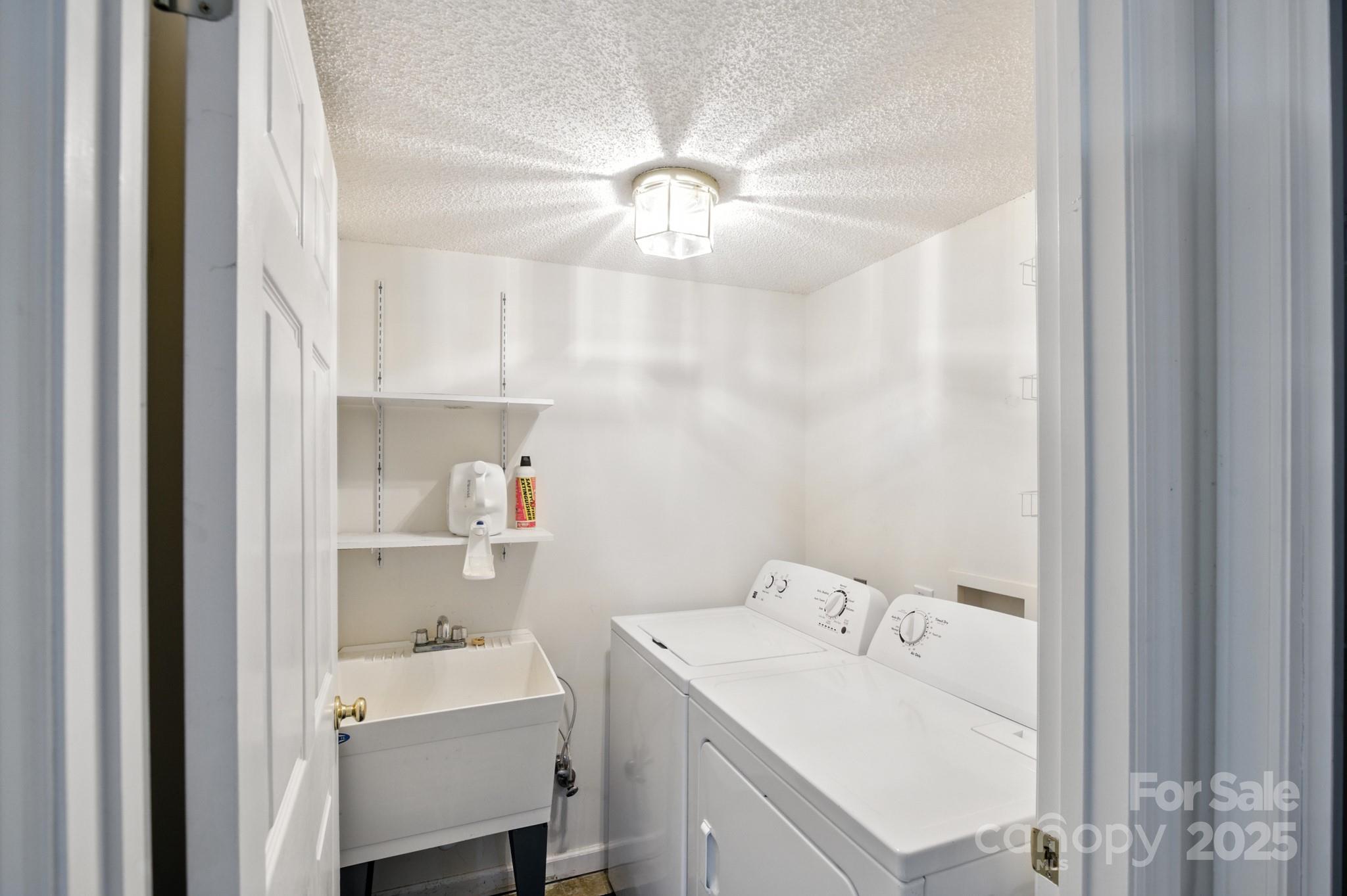 33 Summit Lane Newland, NC 28657 - Photo 43 of 48 a bathroom with a sink a toilet and a mirror