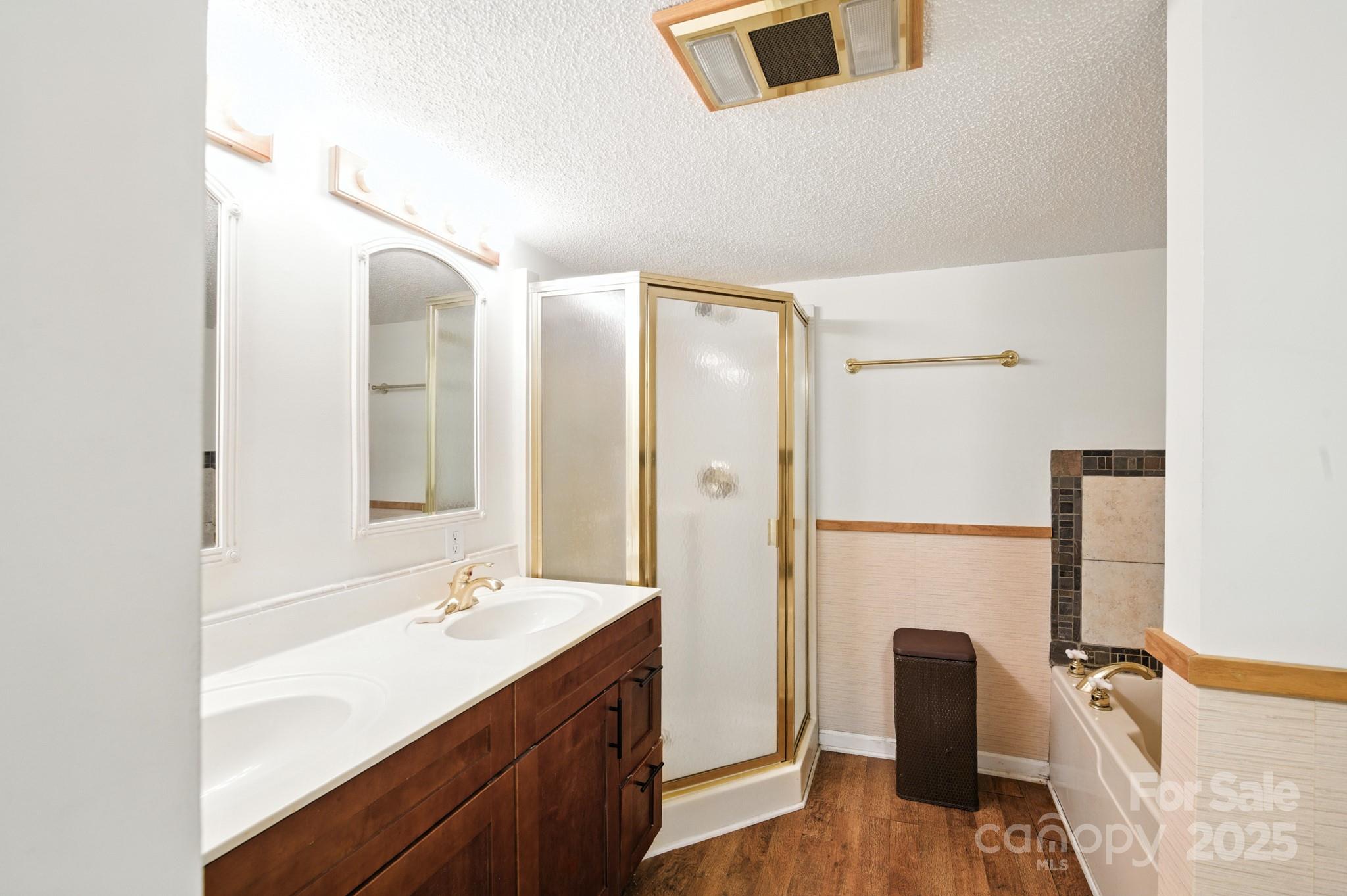 33 Summit Lane Newland, NC 28657 - Photo 44 of 48 a bathroom with a sink a mirror and a shower