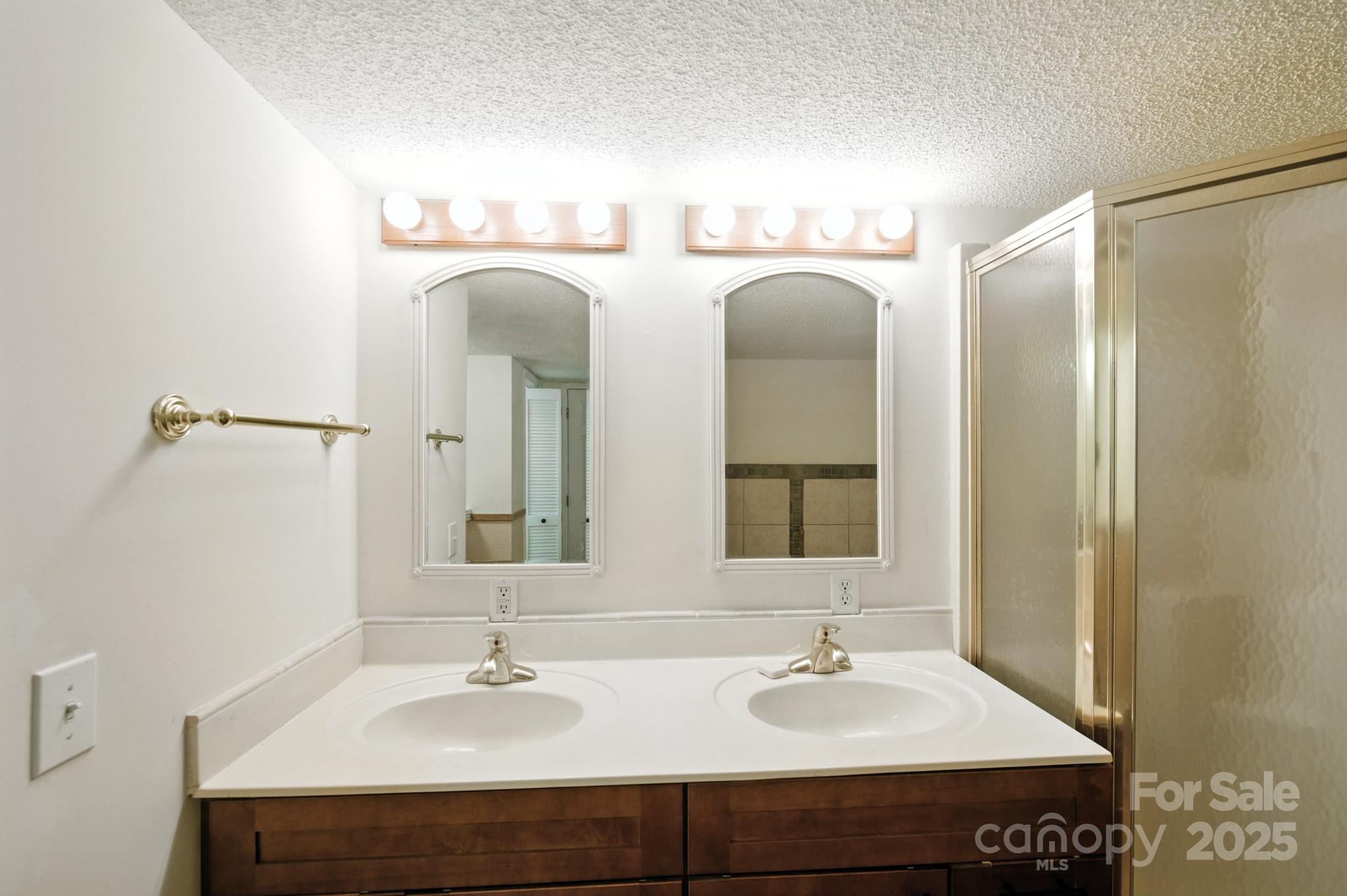 33 Summit Lane Newland, NC 28657 - Photo 45 of 48 a bathroom with a sink and a mirror