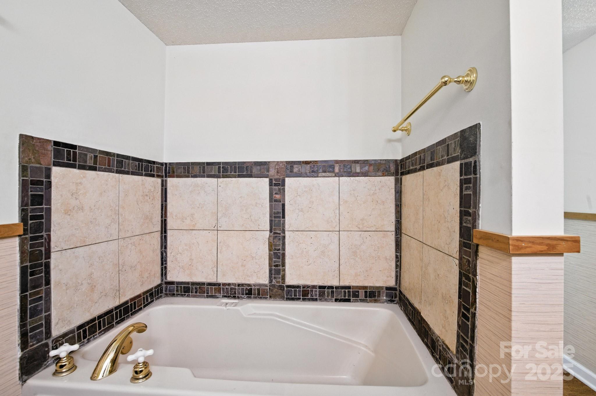 33 Summit Lane Newland, NC 28657 - Photo 46 of 48 a bathroom with a bathtub and a shower