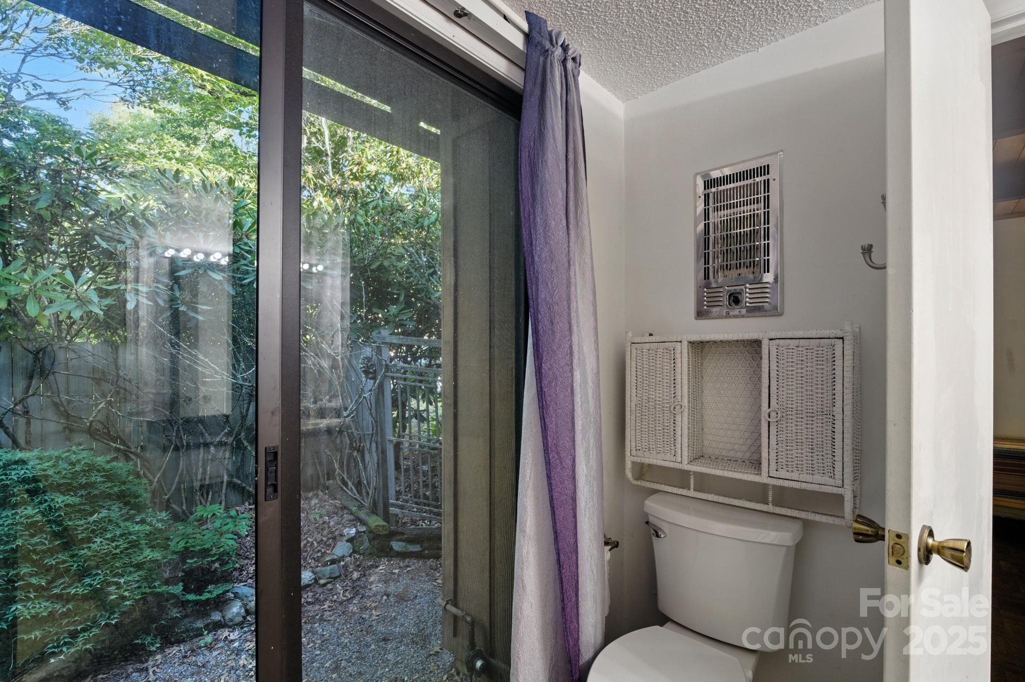 33 Summit Lane Newland, NC 28657 - Photo 48 of 48 a bathroom with a toilet and a shower
