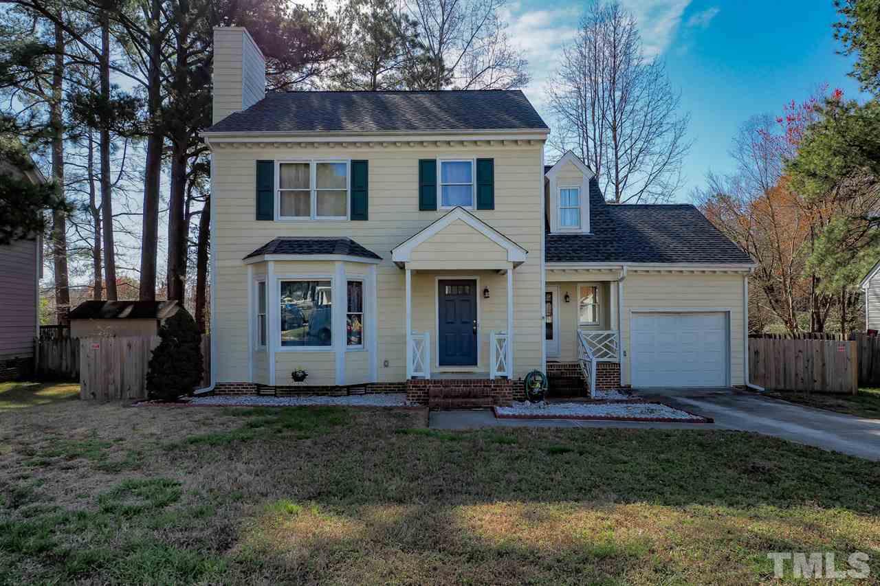 1713 Vintage Road Raleigh, NC 27610 - Photo 1 of 23 a front view of a house with a yard