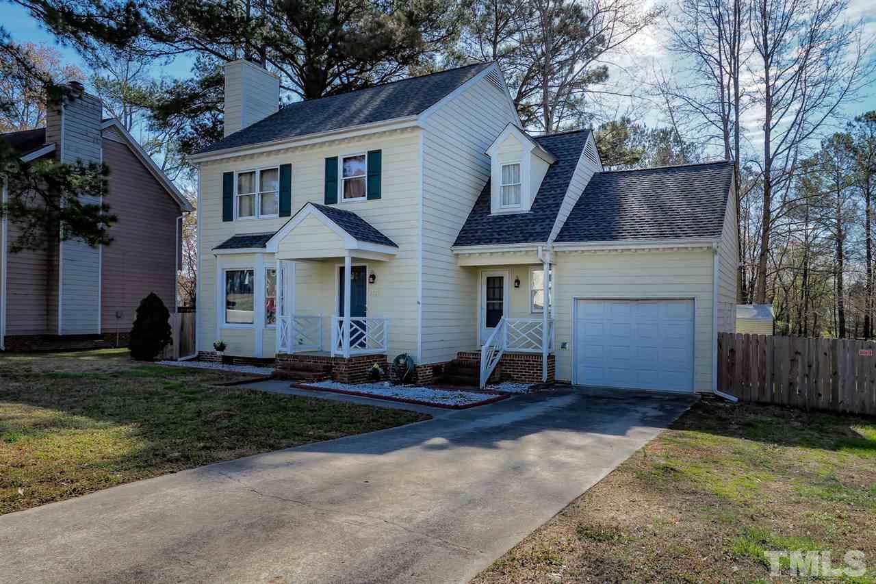1713 Vintage Road Raleigh, NC 27610 - Photo 2 of 23 a front view of a house with a yard