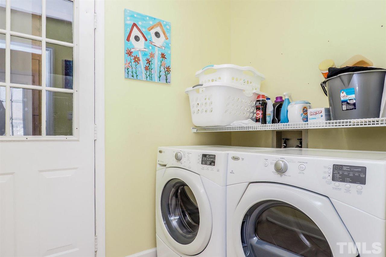 1713 Vintage Road Raleigh, NC 27610 - Photo 11 of 23 a view of entryway with washer and dryer