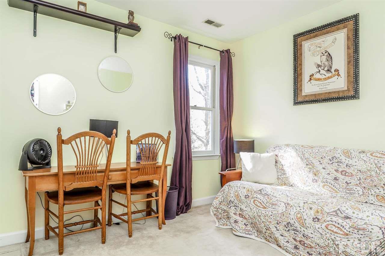1713 Vintage Road Raleigh, NC 27610 - Photo 13 of 23 a bedroom with a bed dresser and a window