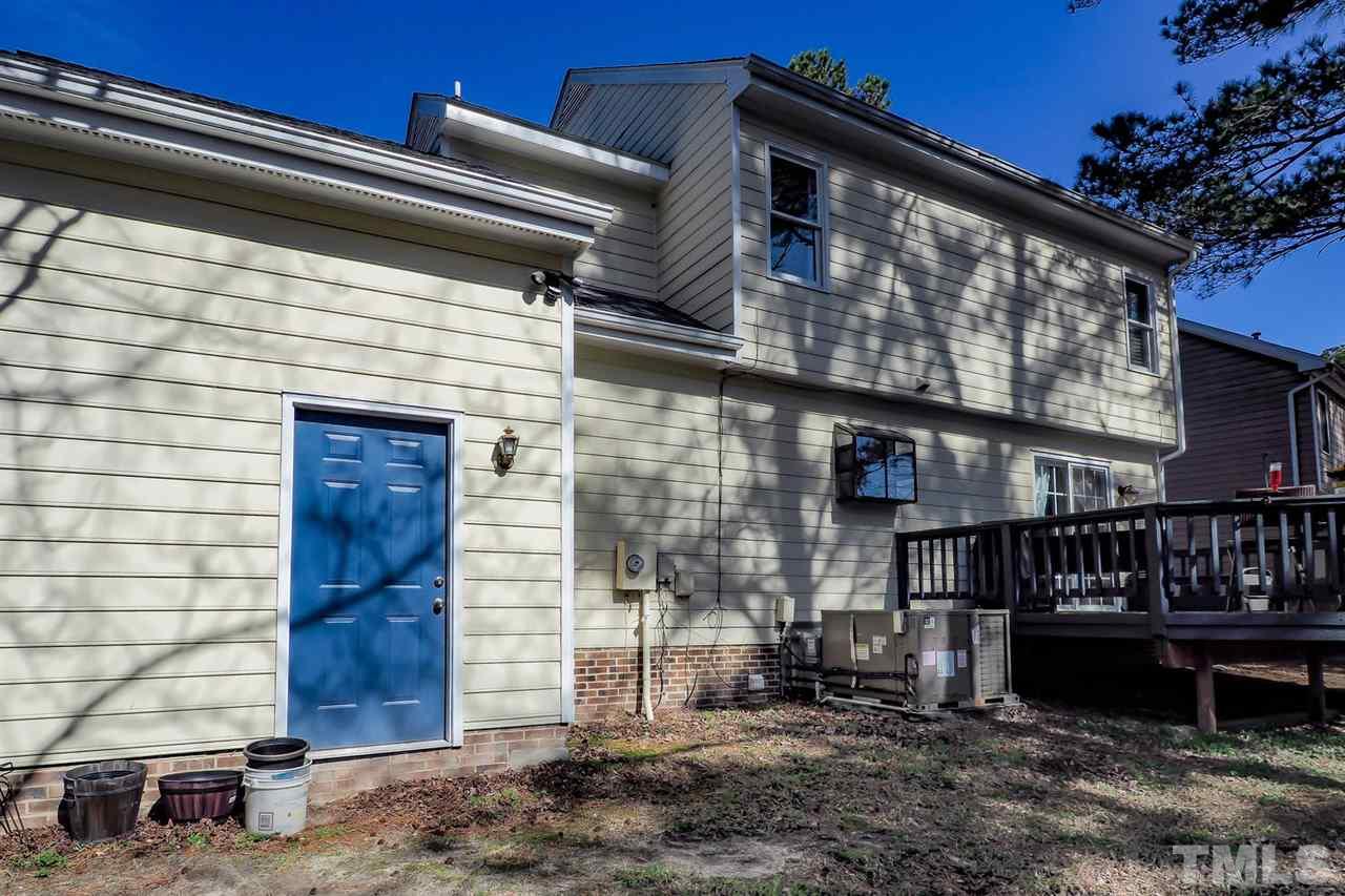 1713 Vintage Road Raleigh, NC 27610 - Photo 19 of 23 a front view of a house with a yard