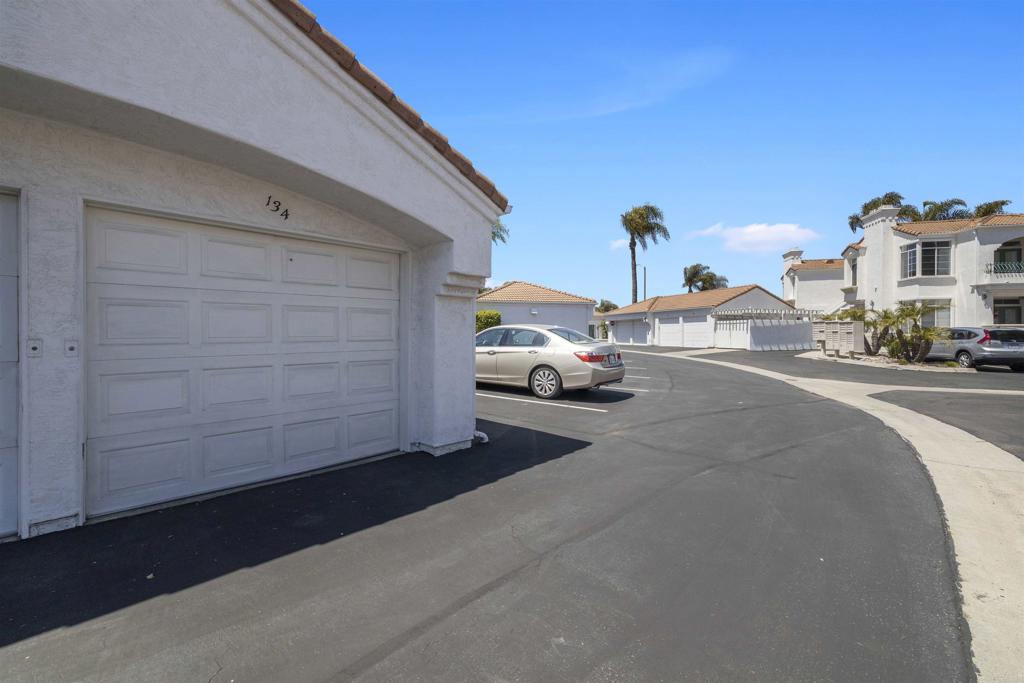 3355 Genoa Way, Unit 134 Oceanside, CA 92056 - Photo 11 of 45 a view of car parked on the road