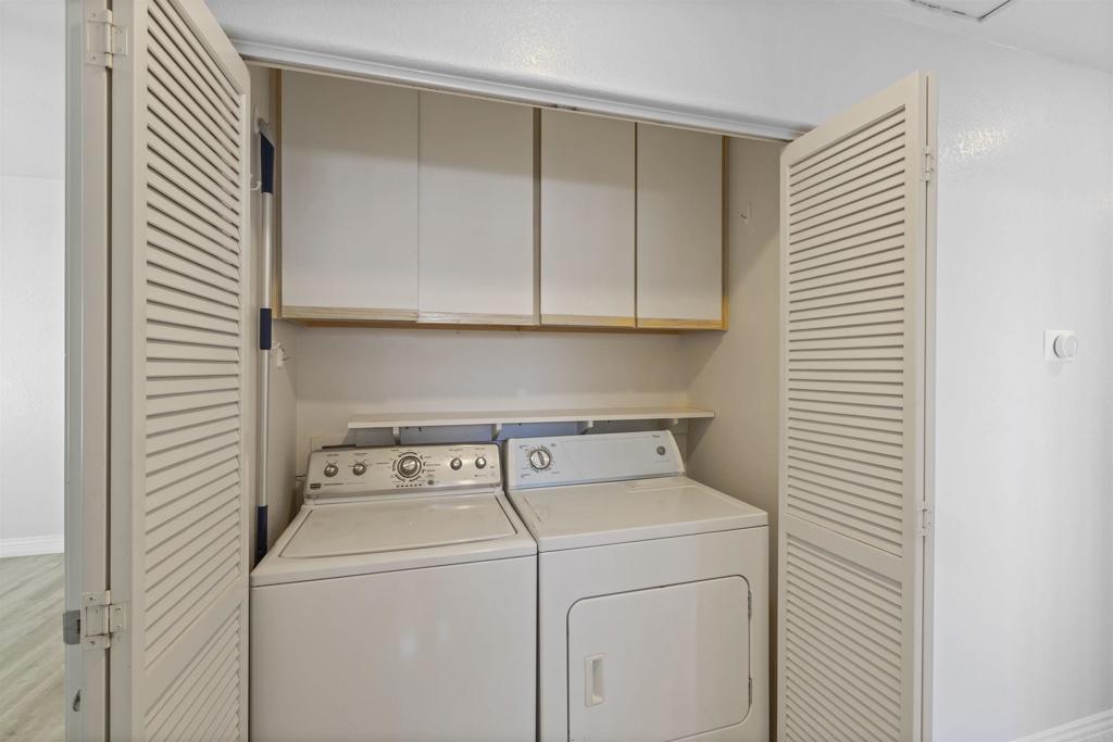 3355 Genoa Way, Unit 134 Oceanside, CA 92056 - Photo 31 of 45 a utility room with dryer and washer
