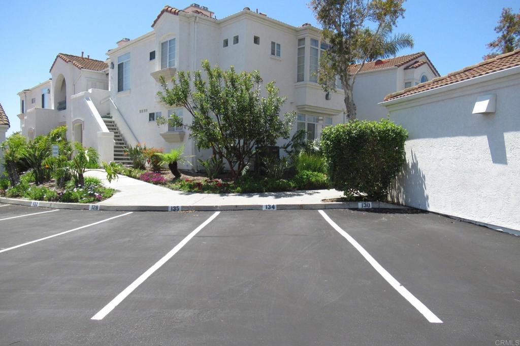 3355 Genoa Way, Unit 134 Oceanside, CA 92056 - Photo 41 of 45 front view of a house with a street