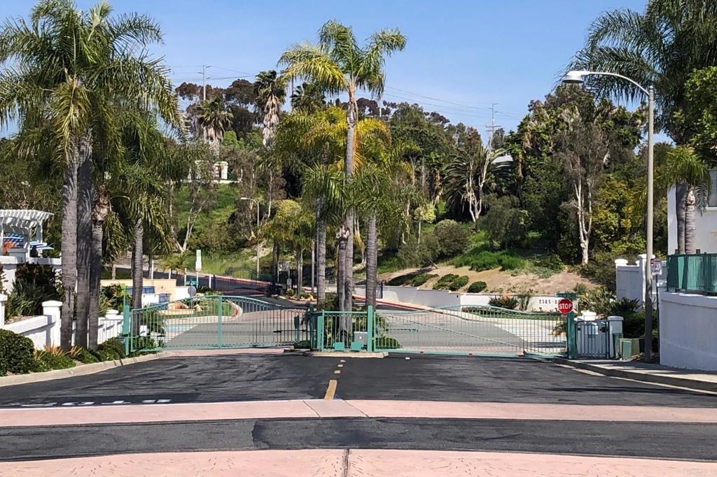 3355 Genoa Way, Unit 134 Oceanside, CA 92056 - Photo 7 of 45 a view of a street with houses on both side