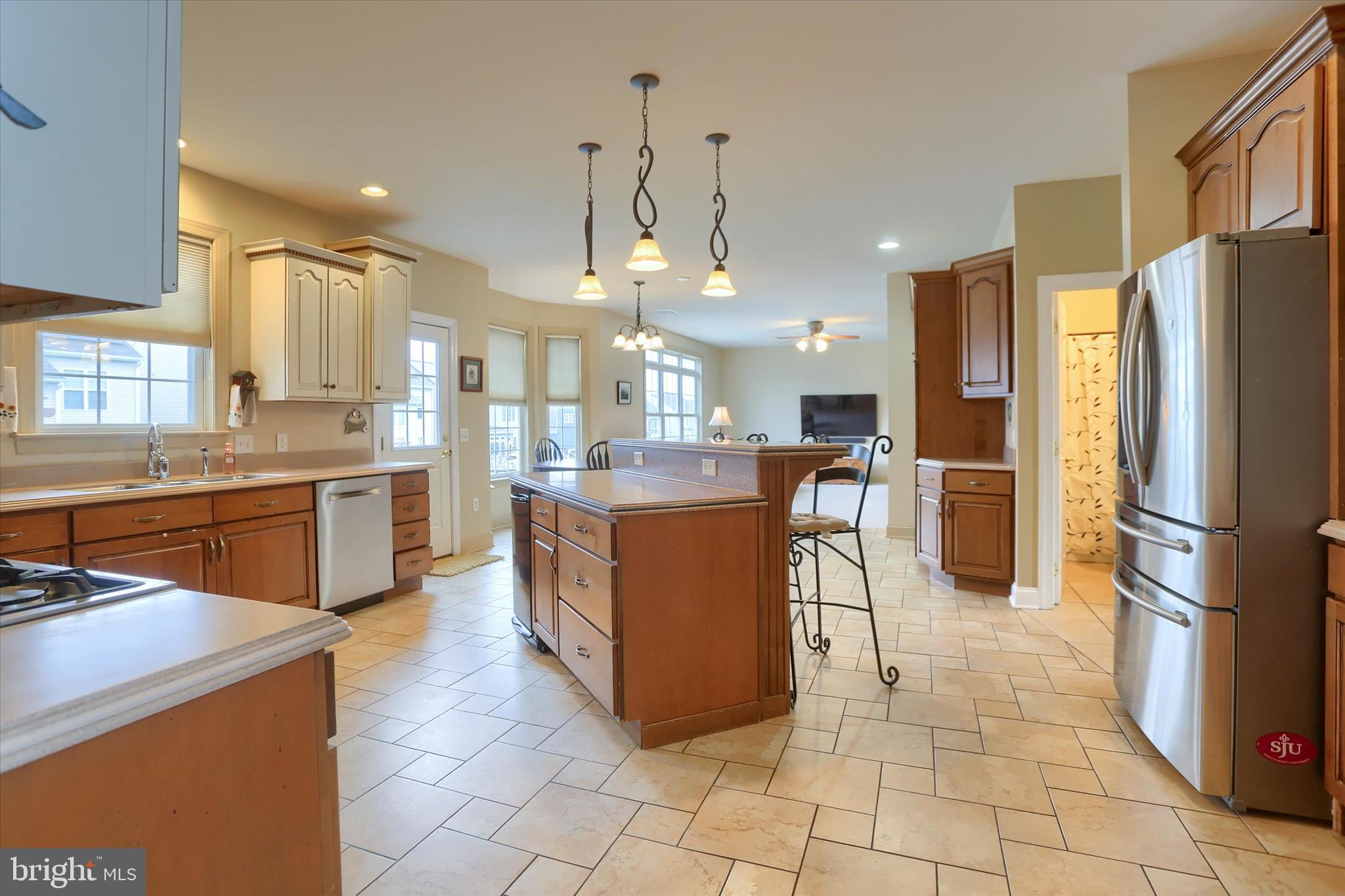 10 Spring View Court Mechanicsburg, PA 17050 - Photo 11 of 50 a kitchen with stainless steel appliances granite countertop a refrigerator a sink a stove and a cabinets