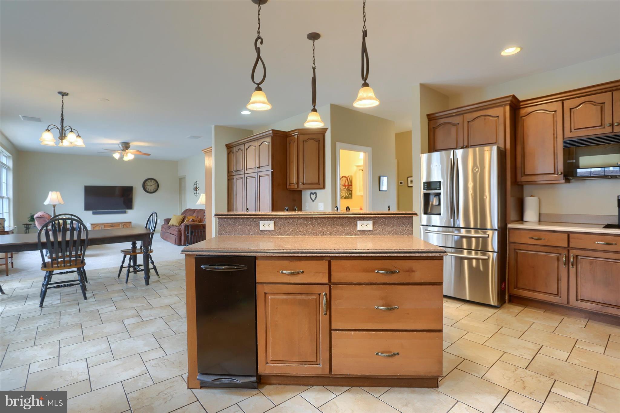 10 Spring View Court Mechanicsburg, PA 17050 - Photo 12 of 50 a kitchen with a sink counter and chairs