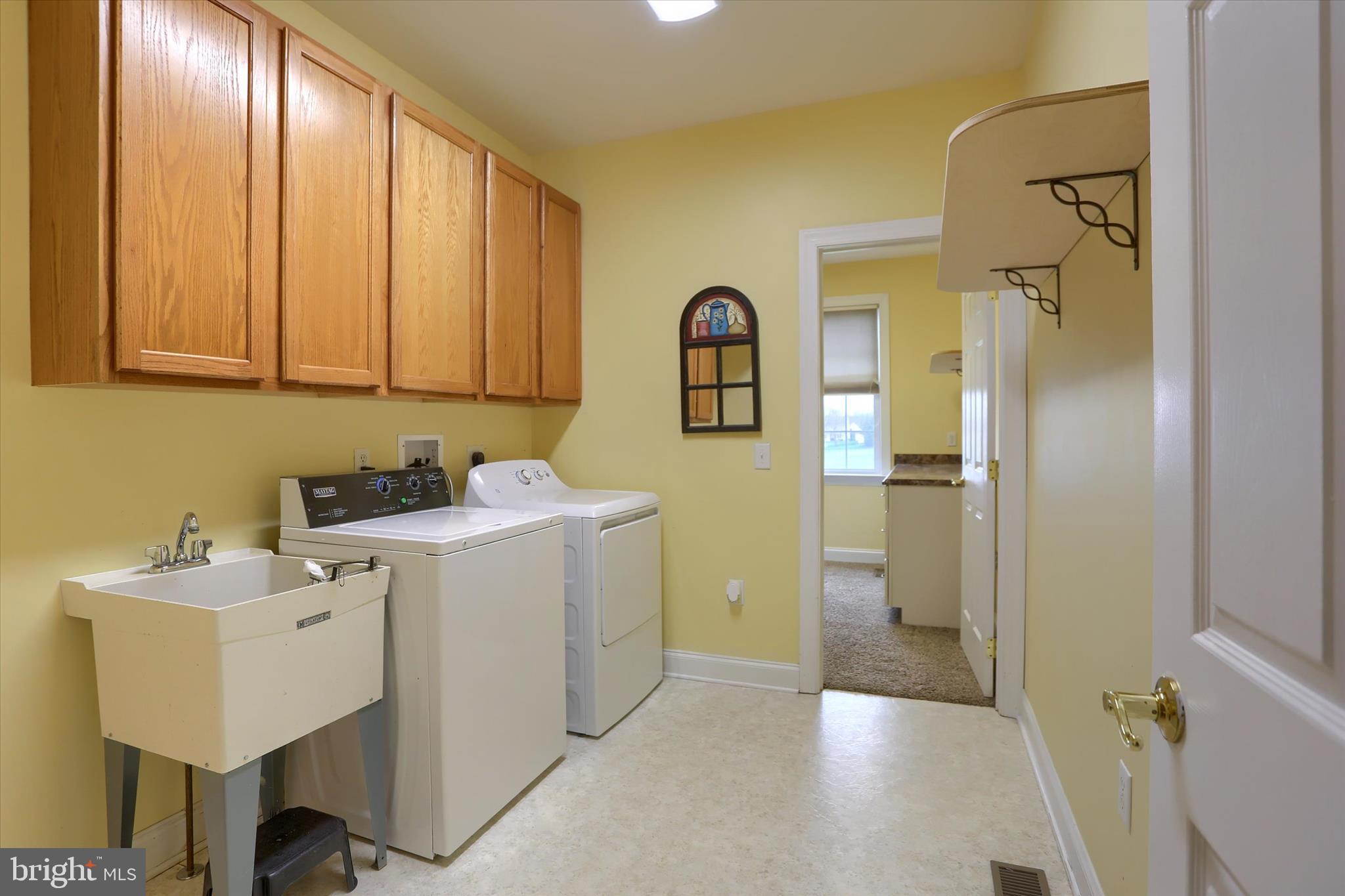 10 Spring View Court Mechanicsburg, PA 17050 - Photo 19 of 50 a view of a hallway with washer and dryer