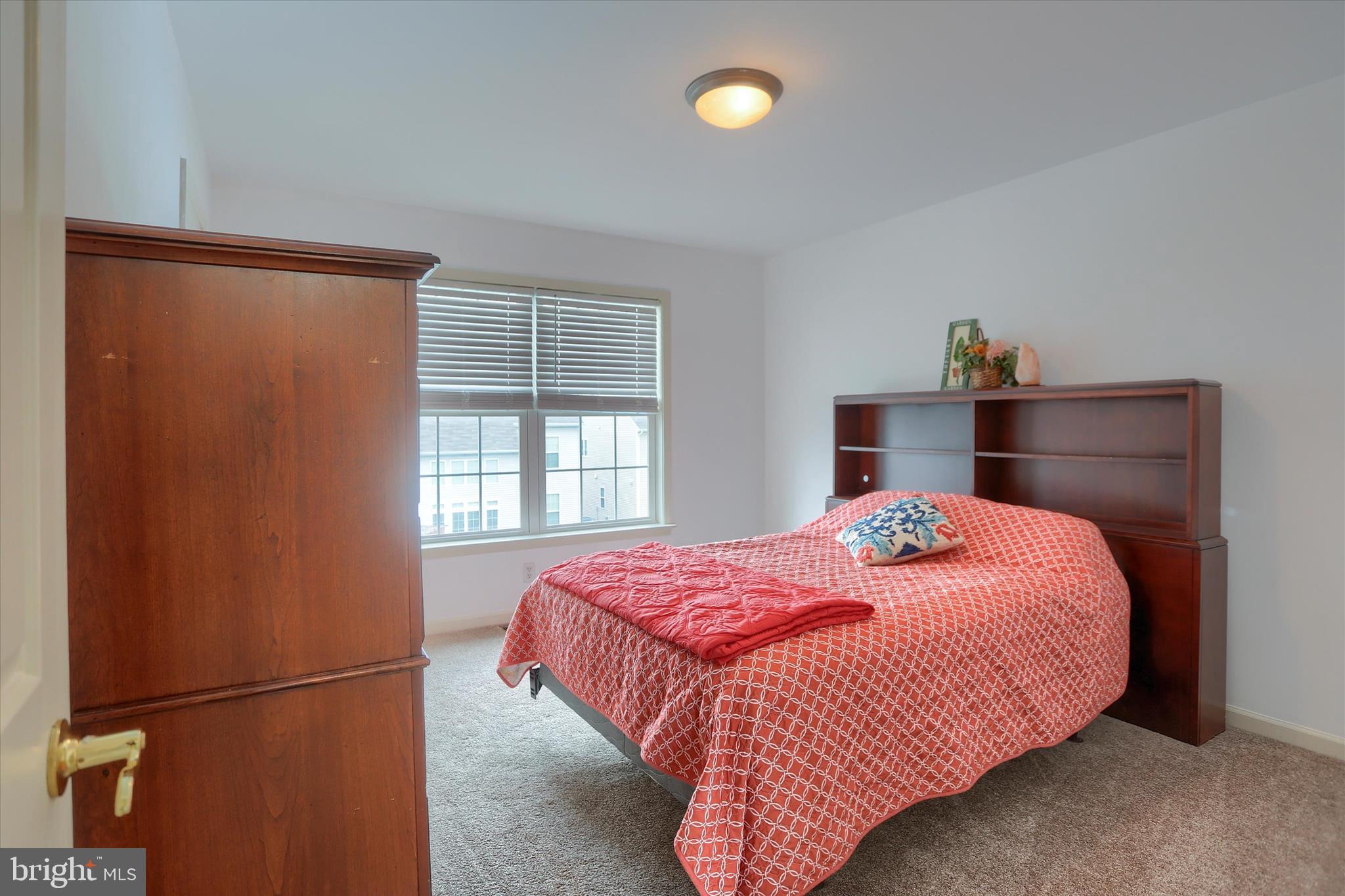 10 Spring View Court Mechanicsburg, PA 17050 - Photo 27 of 50 a bedroom with a bed and a window