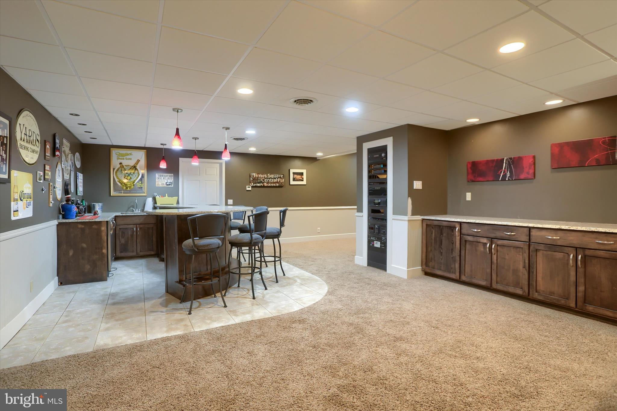 10 Spring View Court Mechanicsburg, PA 17050 - Photo 39 of 50 a living room with stainless steel appliances furniture a rug and a kitchen view