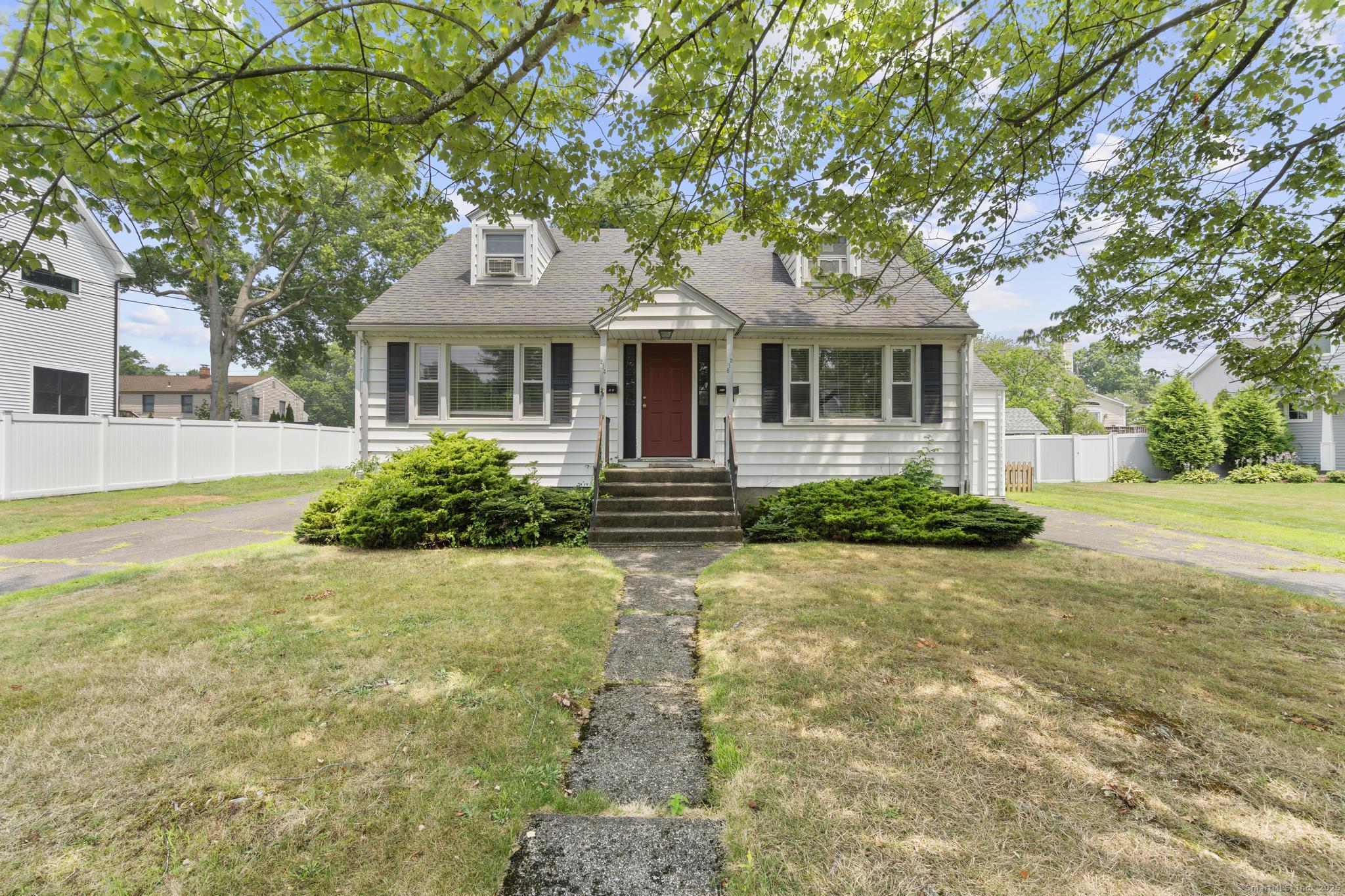 214 Country Road Fairfield, CT 06824 - Photo 1 of 20 a front view of a house with a yard and potted plants