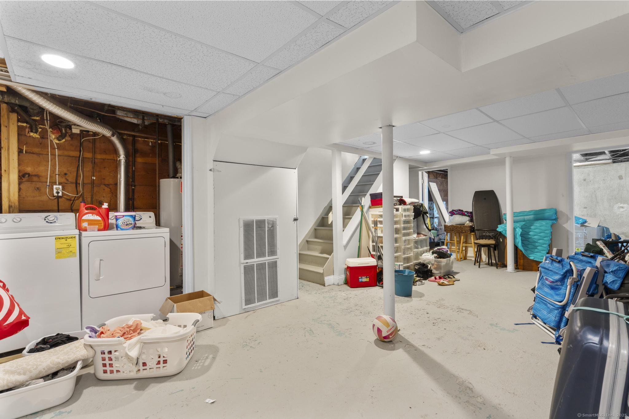 214 Country Road Fairfield, CT 06824 - Photo 17 of 20 a view of a room with gym equipment