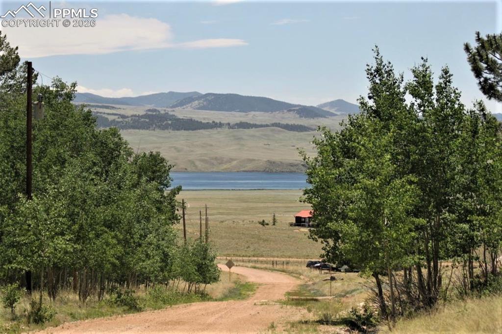 206 Emerald Way Lake George, CO 80827 - Photo 2 of 22 a view of a lake with a mountain in the background