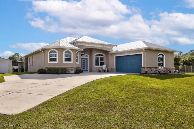 $699,999 | 7825 2nd Terrace, Lehigh Acres, FL 33936