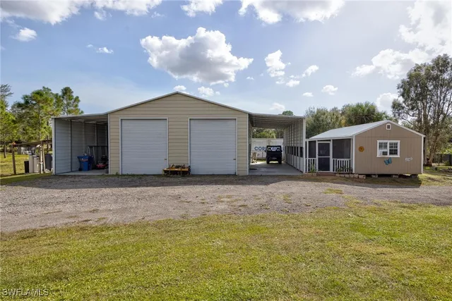 $699,999 | 7825 2nd Terrace, Lehigh Acres, FL 33936