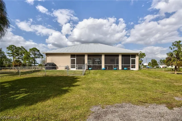 $699,999 | 7825 2nd Terrace, Lehigh Acres, FL 33936