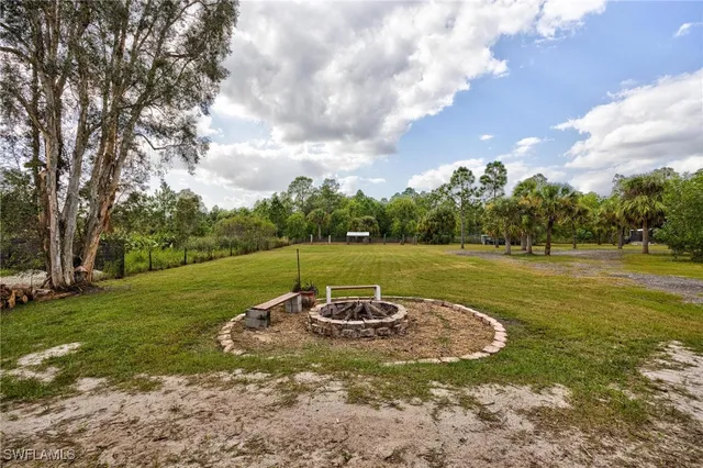 $699,999 | 7825 2nd Terrace, Lehigh Acres, FL 33936