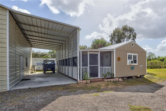 $699,999 | 7825 2nd Terrace, Lehigh Acres, FL 33936