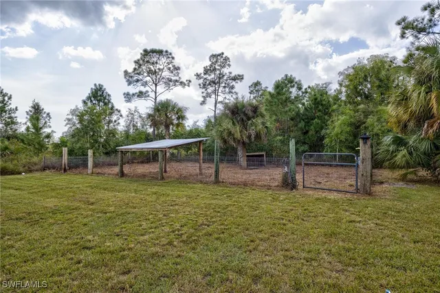 $699,999 | 7825 2nd Terrace, Lehigh Acres, FL 33936