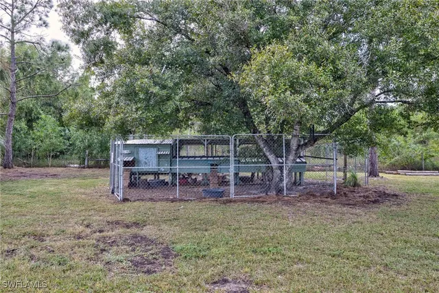 $699,999 | 7825 2nd Terrace, Lehigh Acres, FL 33936