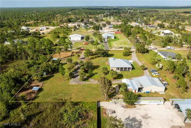 $699,999 | 7825 2nd Terrace, Lehigh Acres, FL 33936