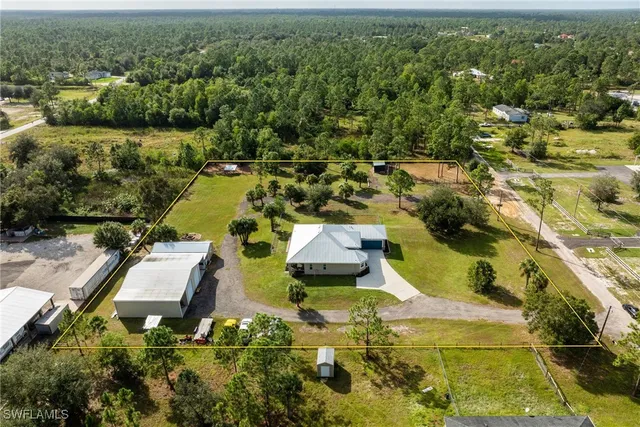 $699,999 | 7825 2nd Terrace, Lehigh Acres, FL 33936