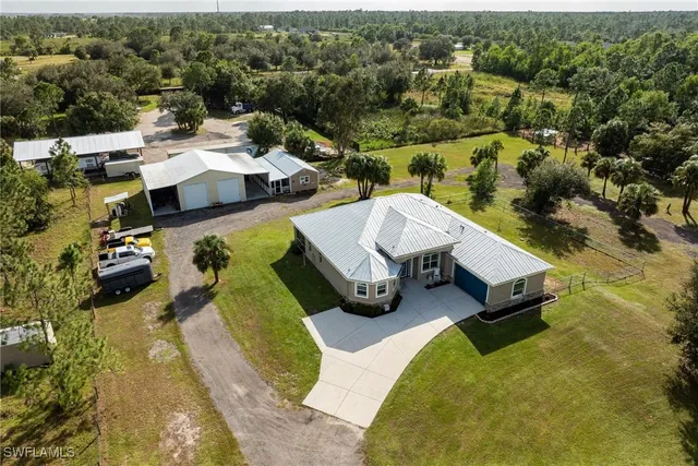 $699,999 | 7825 2nd Terrace, Lehigh Acres, FL 33936