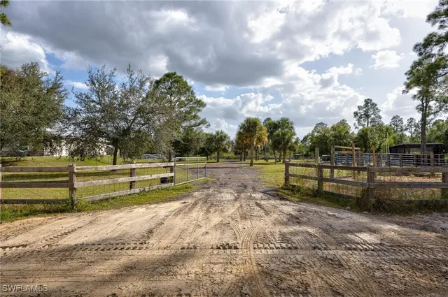 $699,999 | 7825 2nd Terrace, Lehigh Acres, FL 33936