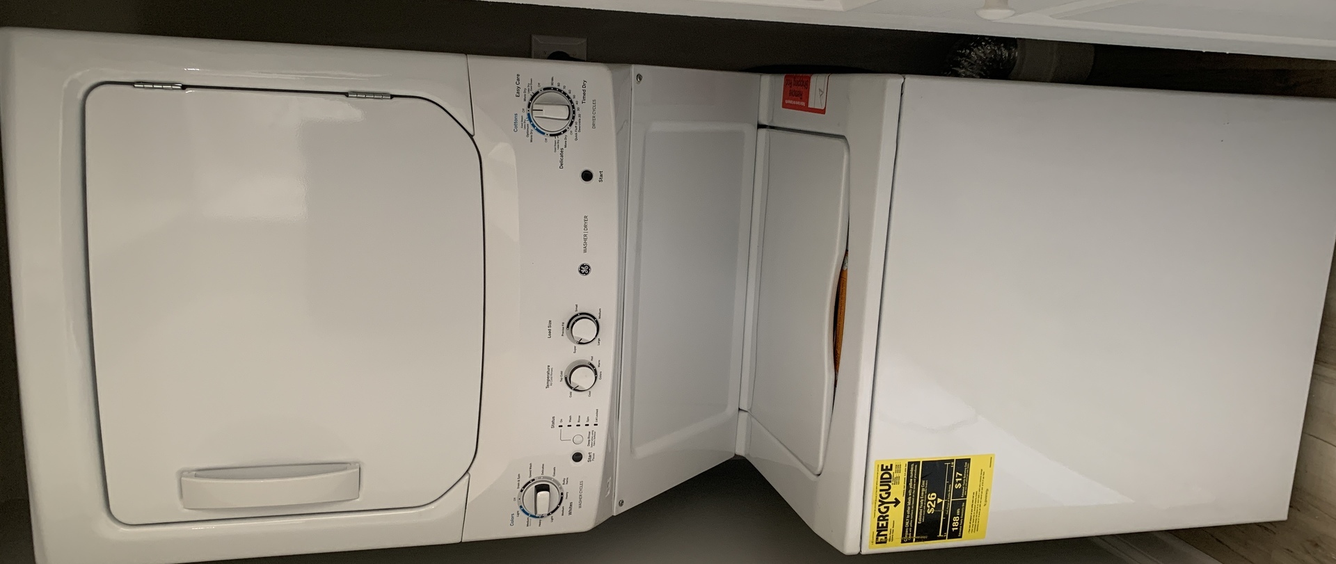 8141 84th Place, Unit 1D Justice, IL 60458 - Photo 17 of 18 a close view of a utility room with dryer and washer