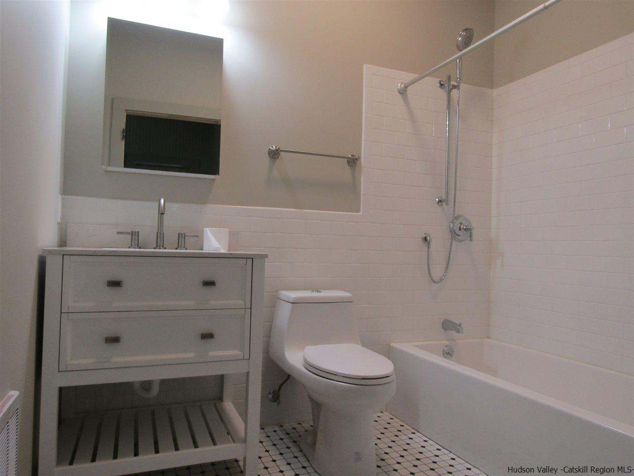 64 Macdaniel Road Woodstock, NY 12498 - Photo 23 of 35 a bathroom with a sink a toilet and shower