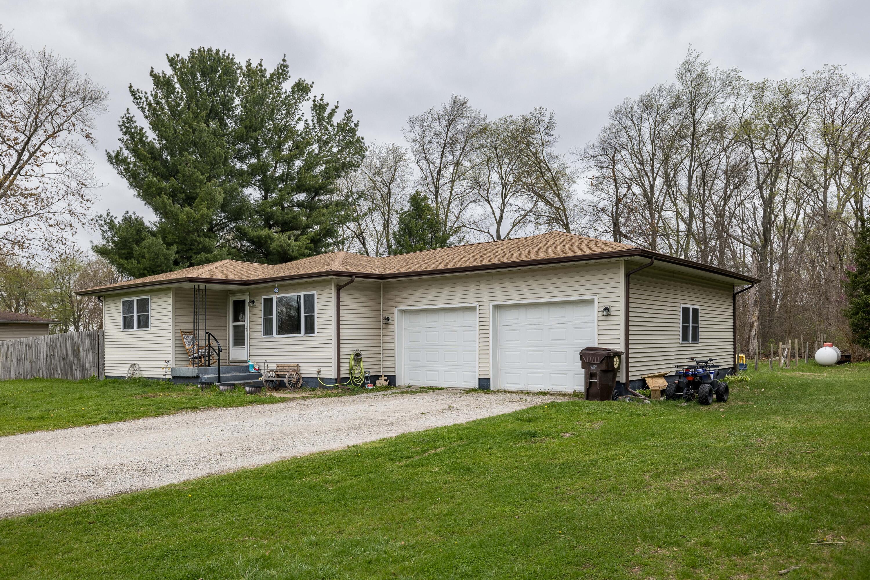 7612 Graefen Drive Demotte, IN 46310 - Photo 1 of 25 a front view of house with yard and green space