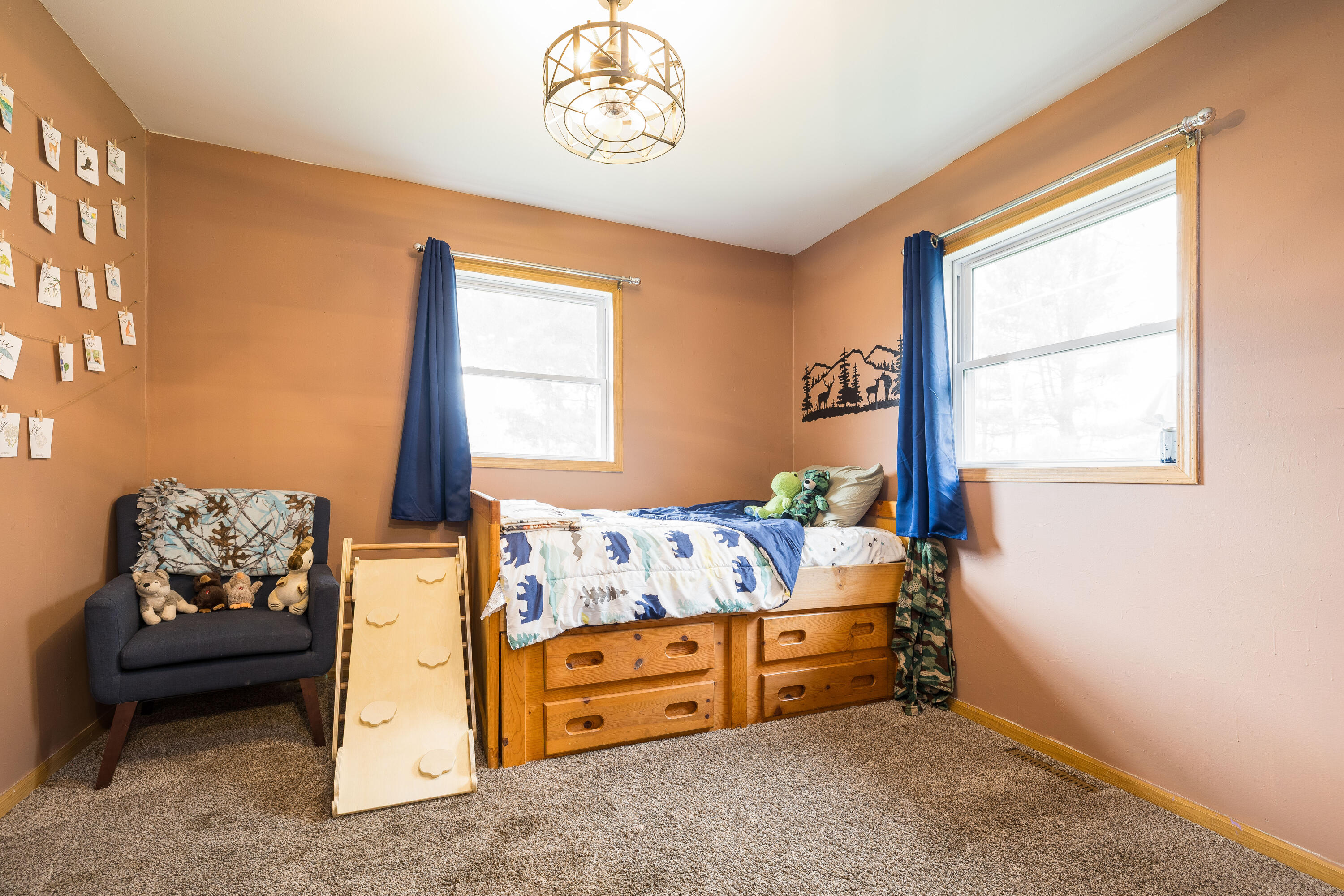 7612 Graefen Drive Demotte, IN 46310 - Photo 18 of 25 a bedroom with a bed and a window