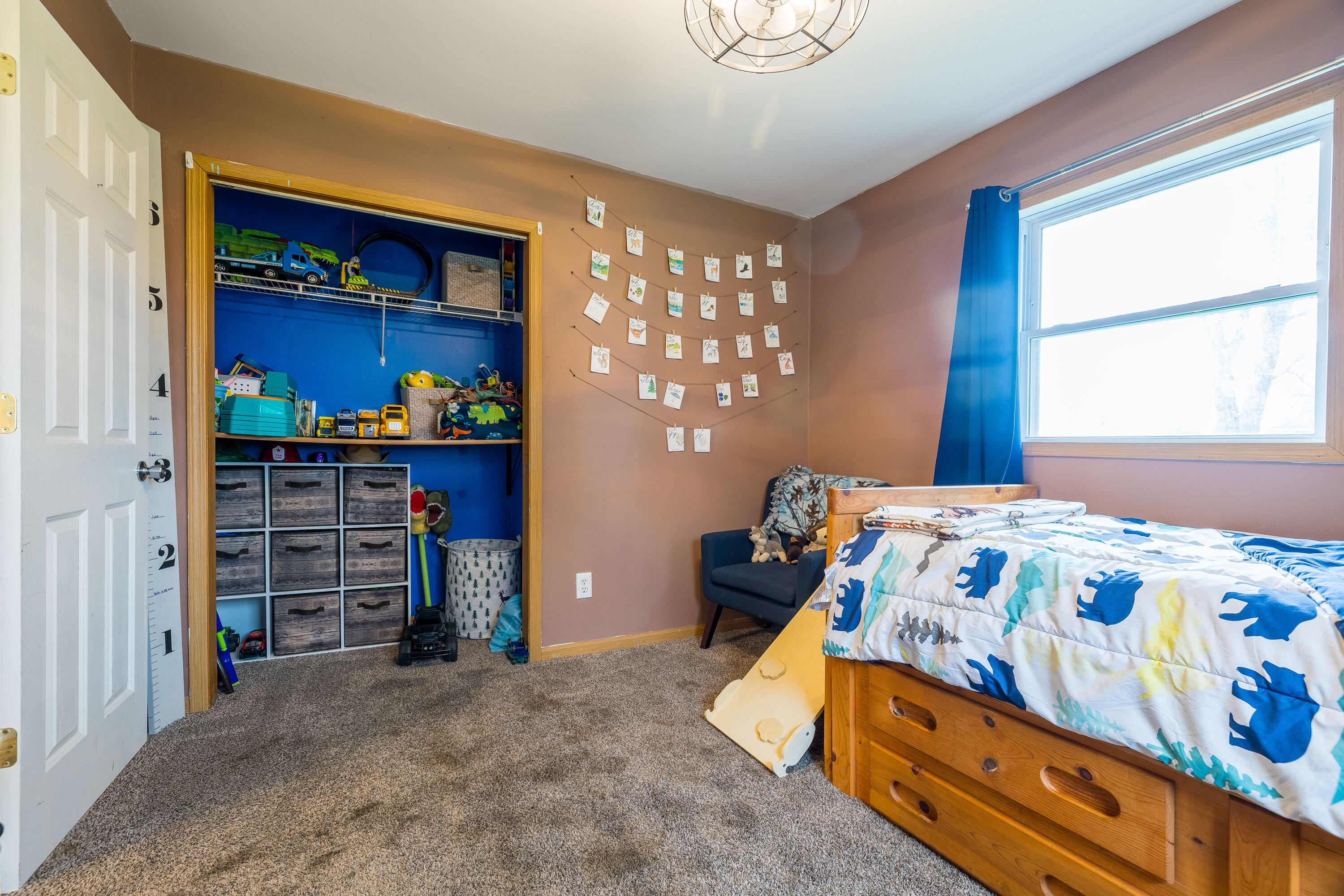 7612 Graefen Drive Demotte, IN 46310 - Photo 19 of 25 a bedroom with a bed and a window