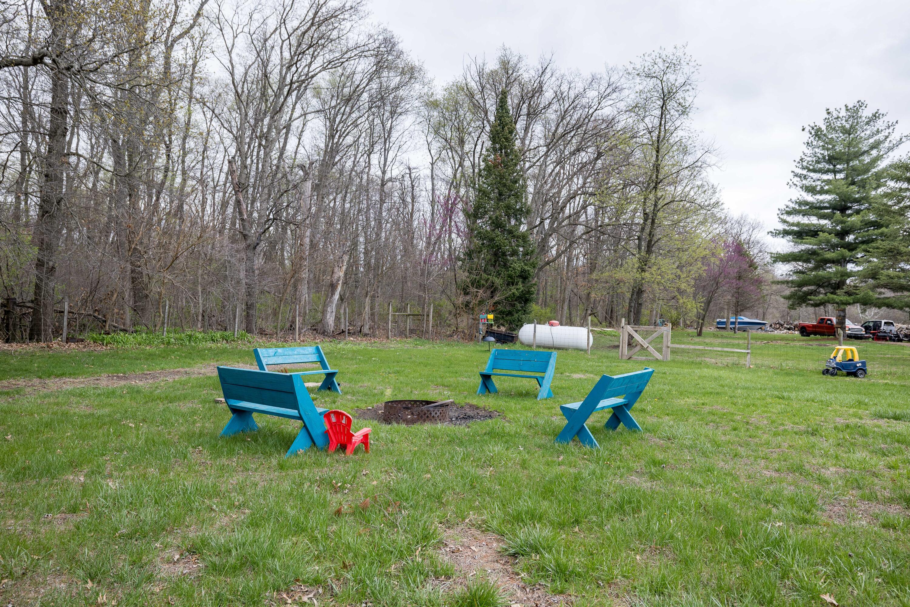 7612 Graefen Drive Demotte, IN 46310 - Photo 24 of 25 a backyard of a house with table and chairs