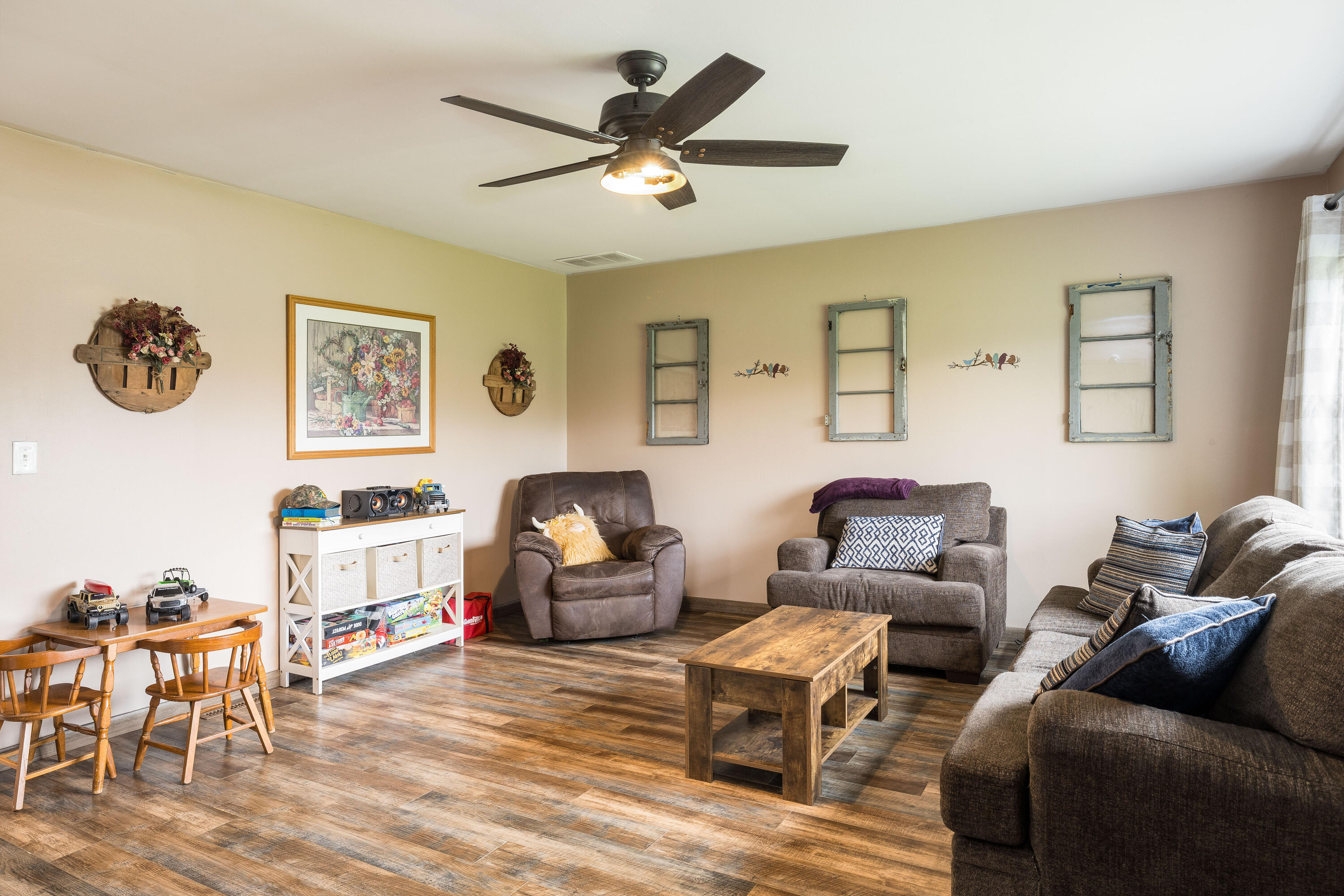 7612 Graefen Drive Demotte, IN 46310 - Photo 8 of 25 a living room with furniture and a window
