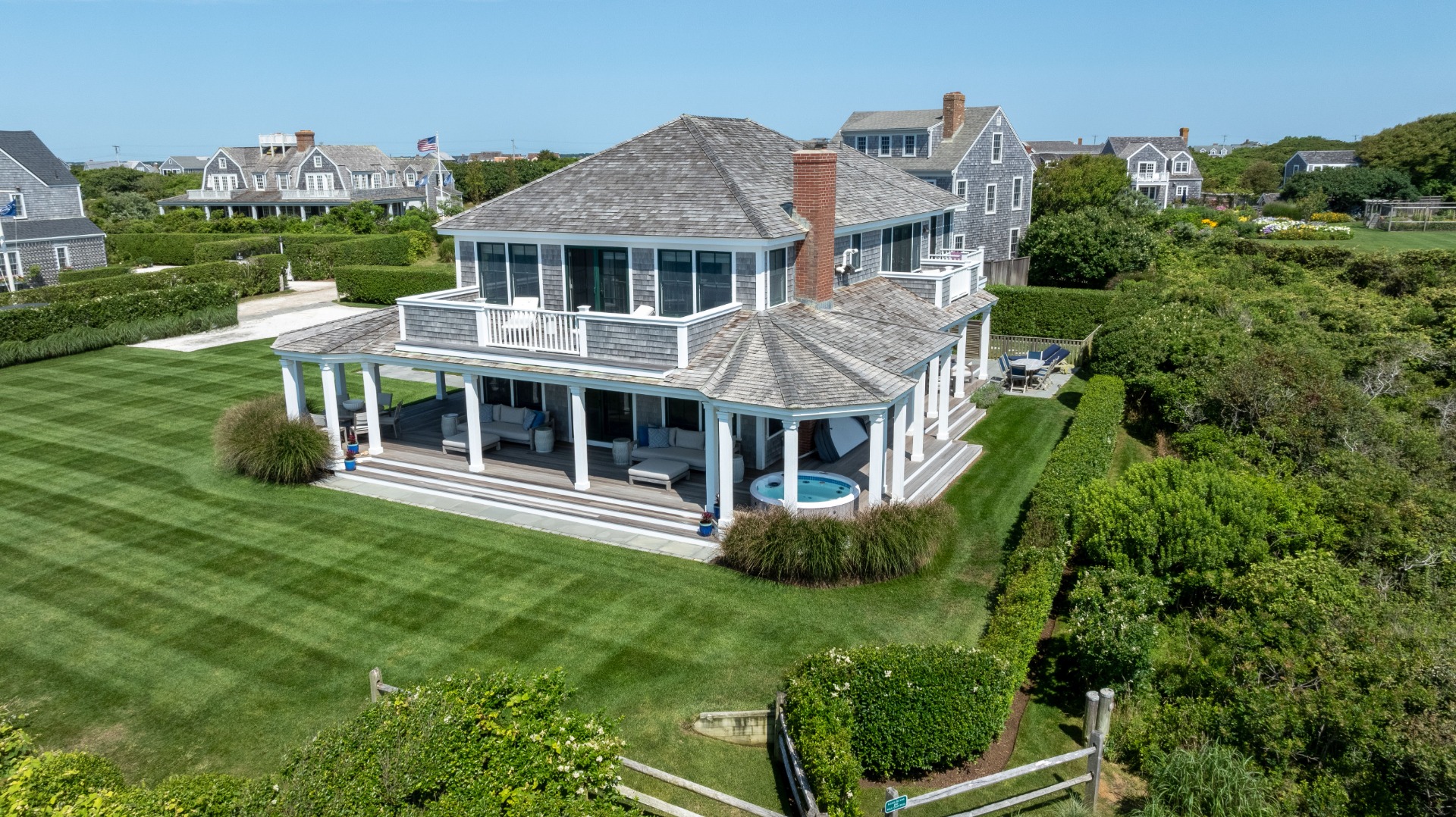 34 Bosworth Road Nantucket, MA 02554 - Photo 5 of 38 front view of a house with a yard