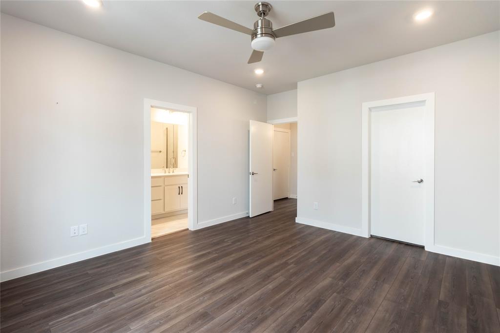 2348 Rook Drive Dallas, TX 75211 - Photo 15 of 21 a view of an empty room with wooden floor