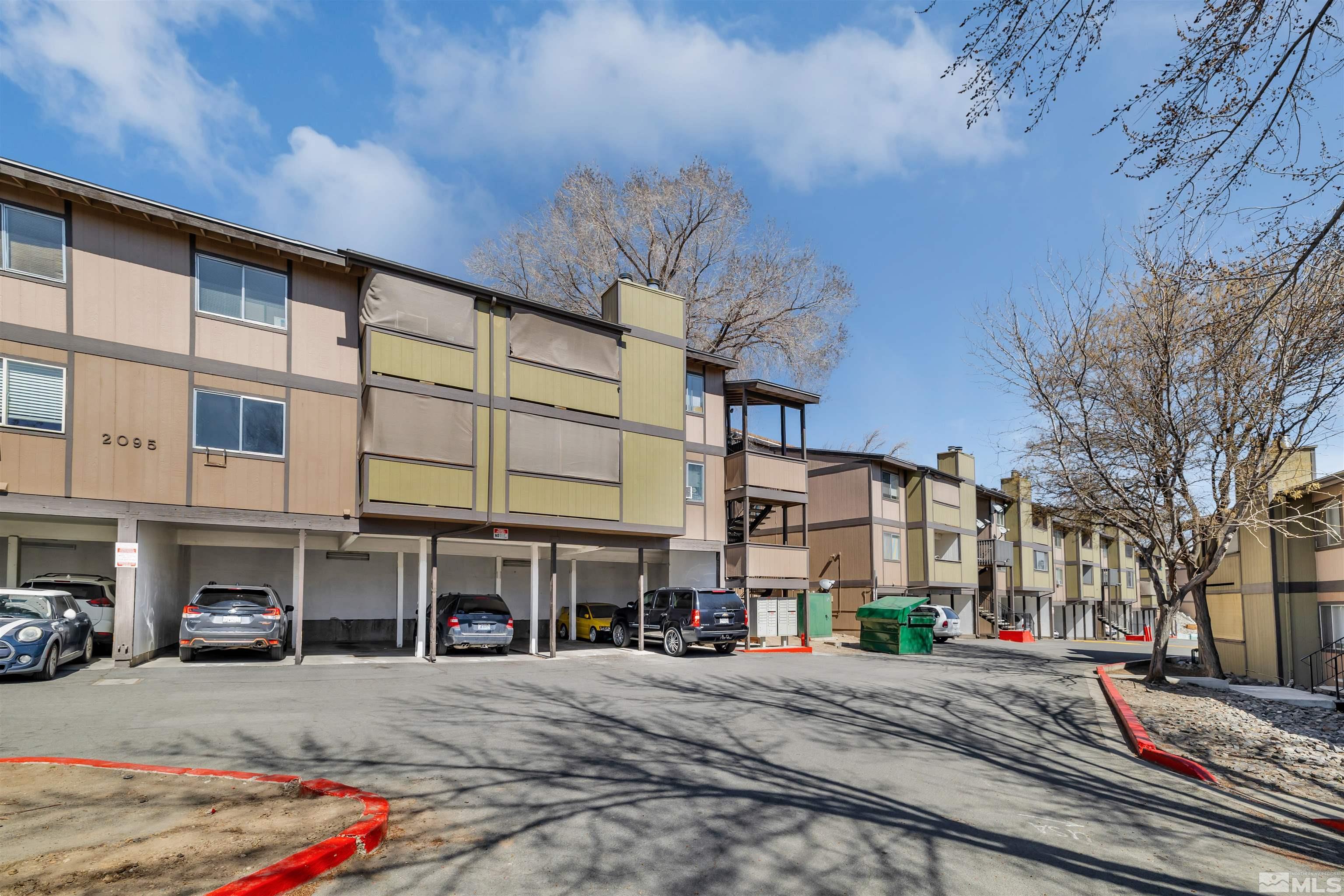 2095 Highview Court, Unit 3 Reno, NV 89512 - Photo 20 of 20 a city street lined with buildings and cars