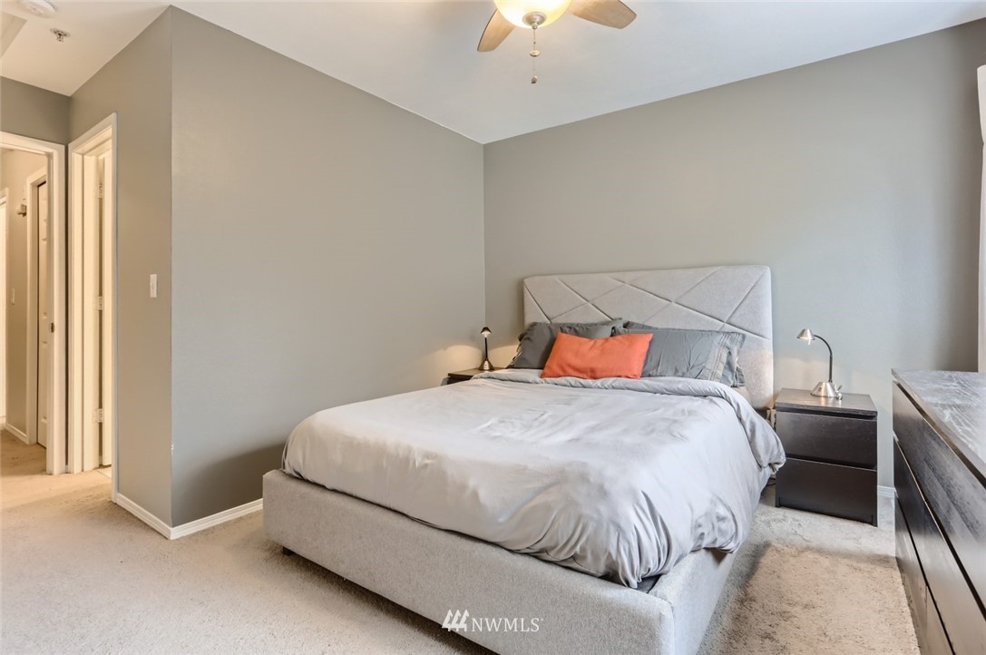 13400 Dumas Road, Unit E3 Mill Creek, WA 98012 - Photo 16 of 28 a bedroom with a bed and window