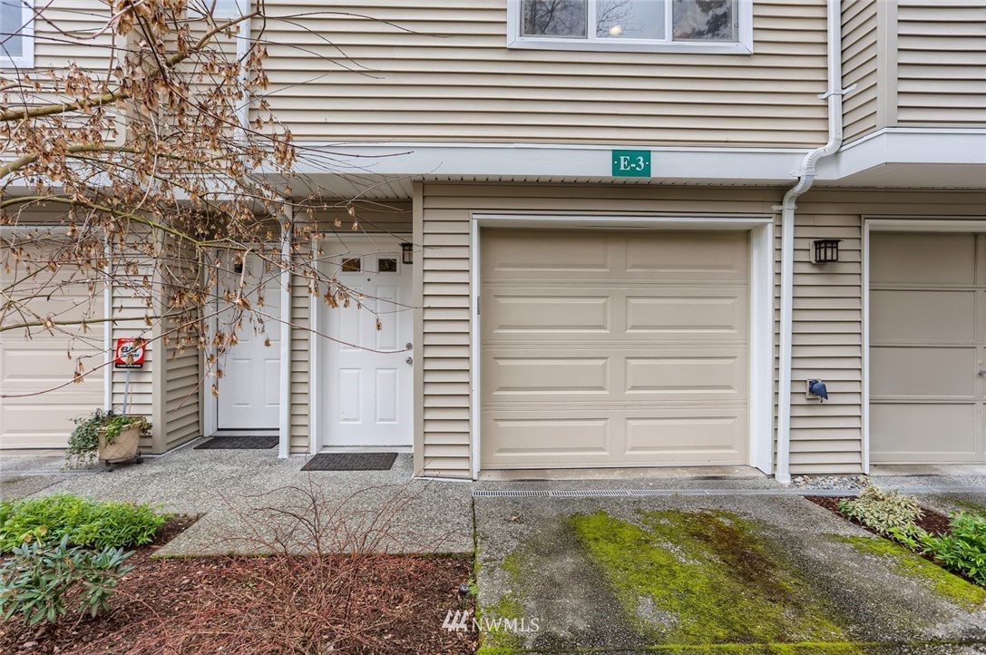 13400 Dumas Road, Unit E3 Mill Creek, WA 98012 - Photo 2 of 28 a front view of a house