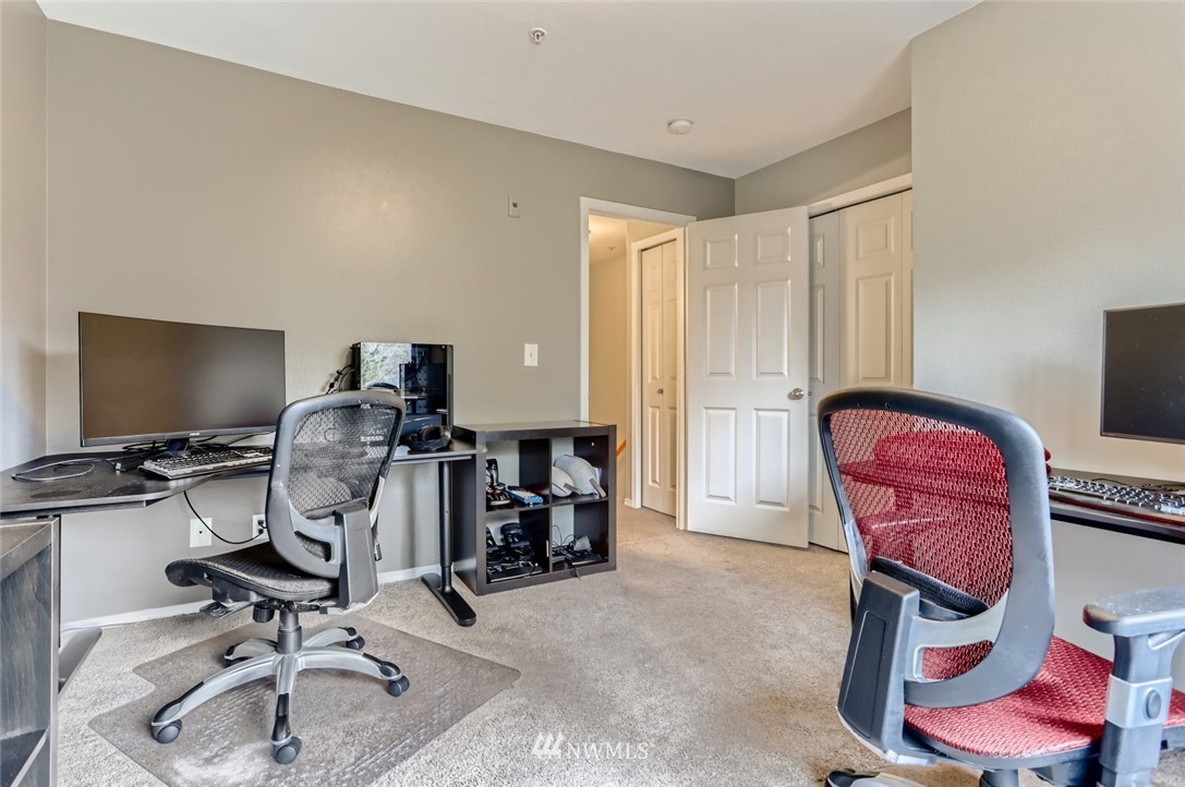 13400 Dumas Road, Unit E3 Mill Creek, WA 98012 - Photo 21 of 28 a view of a workspace with furniture and gym equipment